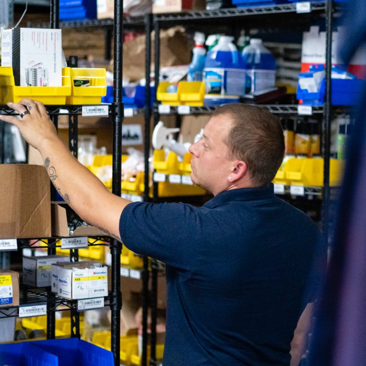 Bethany Air HVAC contractor organizing heating and cooling supplies in Arnold MD